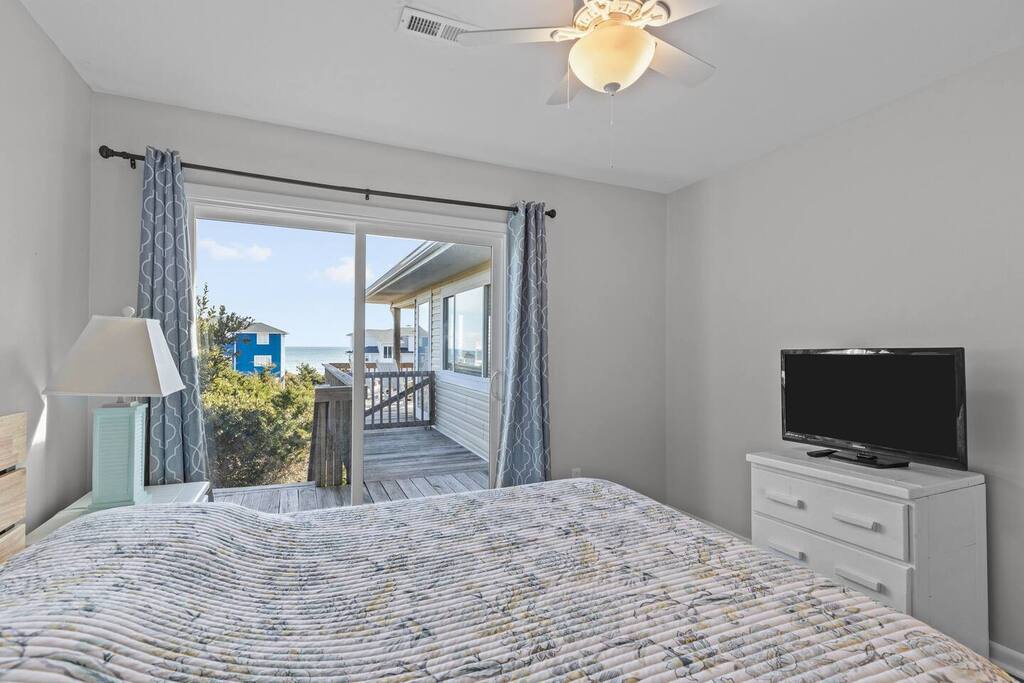 Wake up to ocean views from your comfortable bed, then step onto your private deck to start the day with fresh sea air.