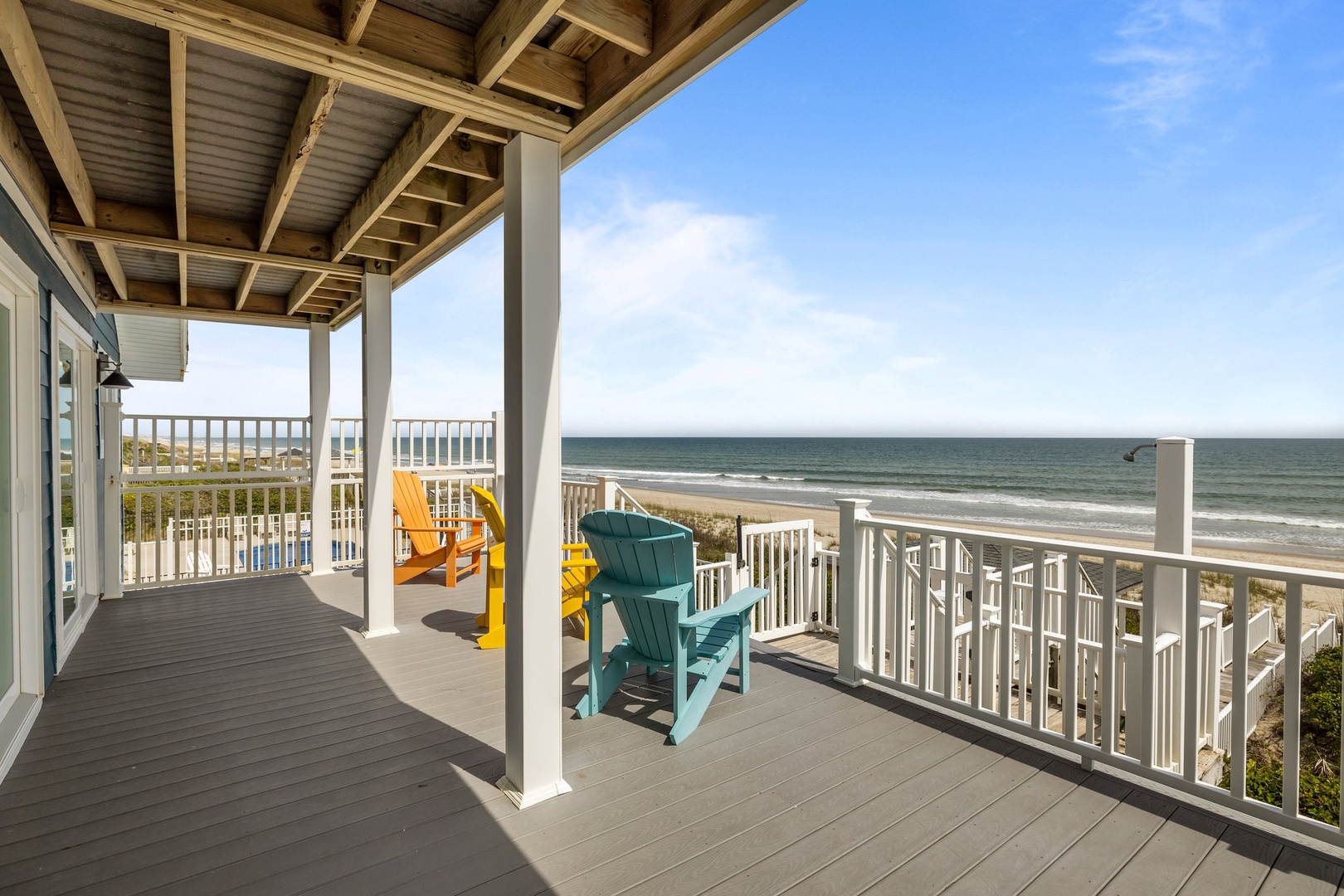 Settle into colorful Adirondack chairs on your private oceanfront deck and soak in the endless sea views.
