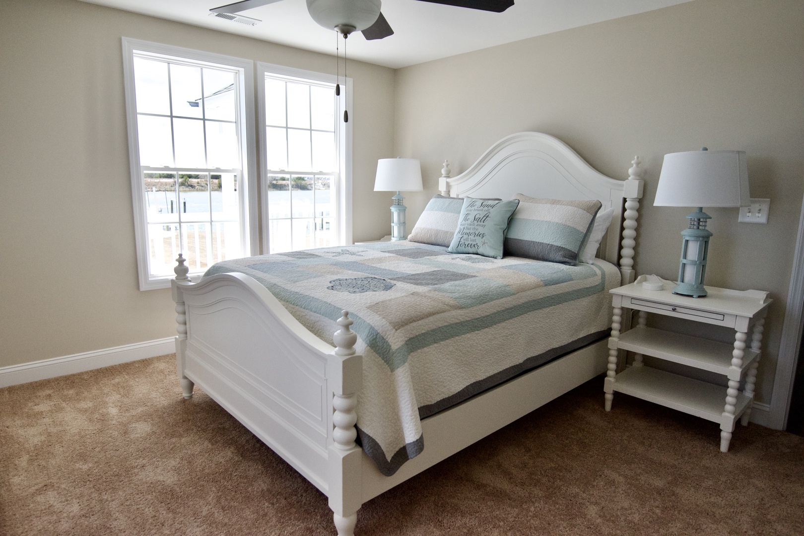 Drift off peacefully in your charming bedroom with soft linens, gentle natural light, and coastal-inspired décor creating the perfect retreat.