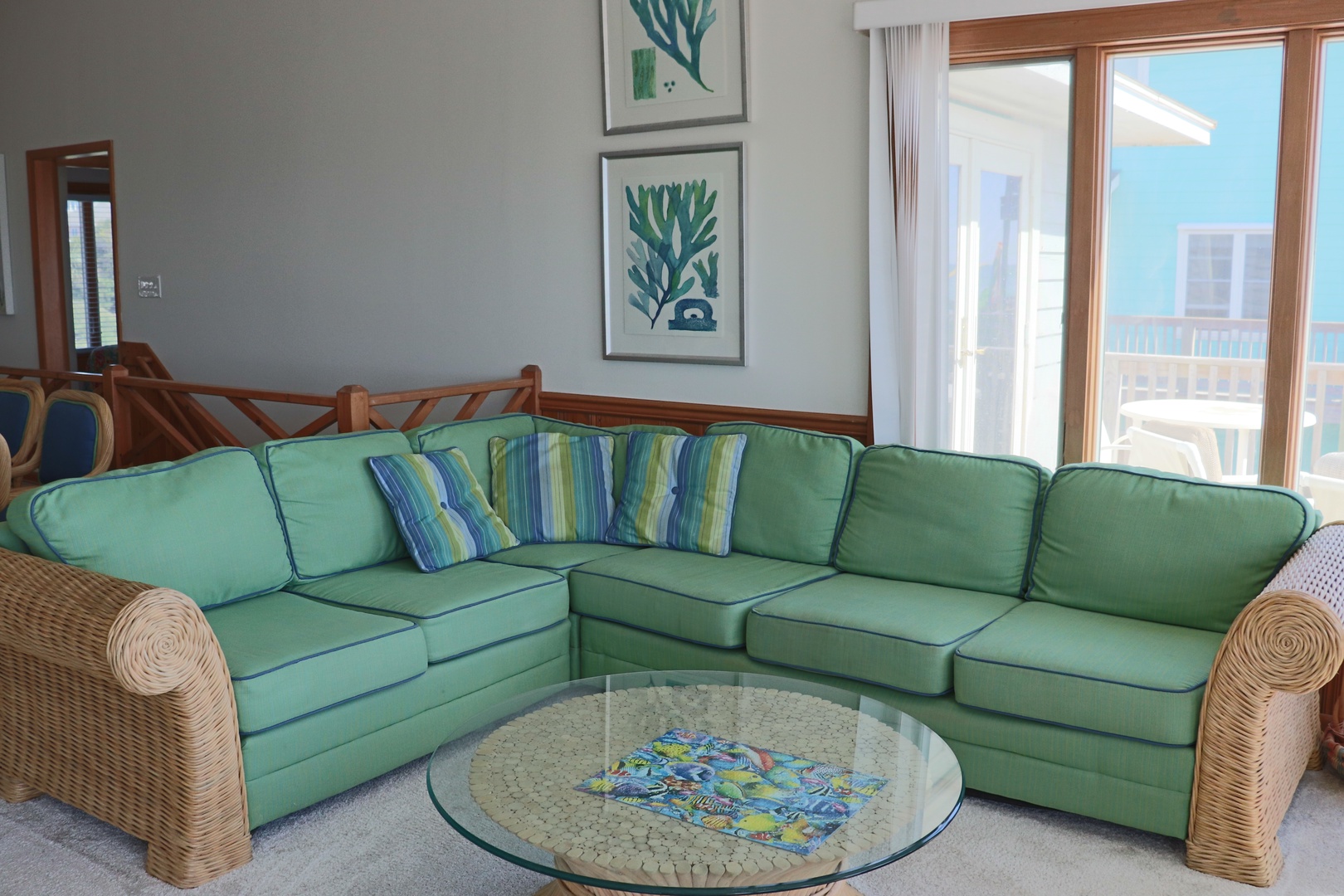 Sink into your private coastal retreat with this spacious sectional sofa, where ocean breezes drift through your windows.