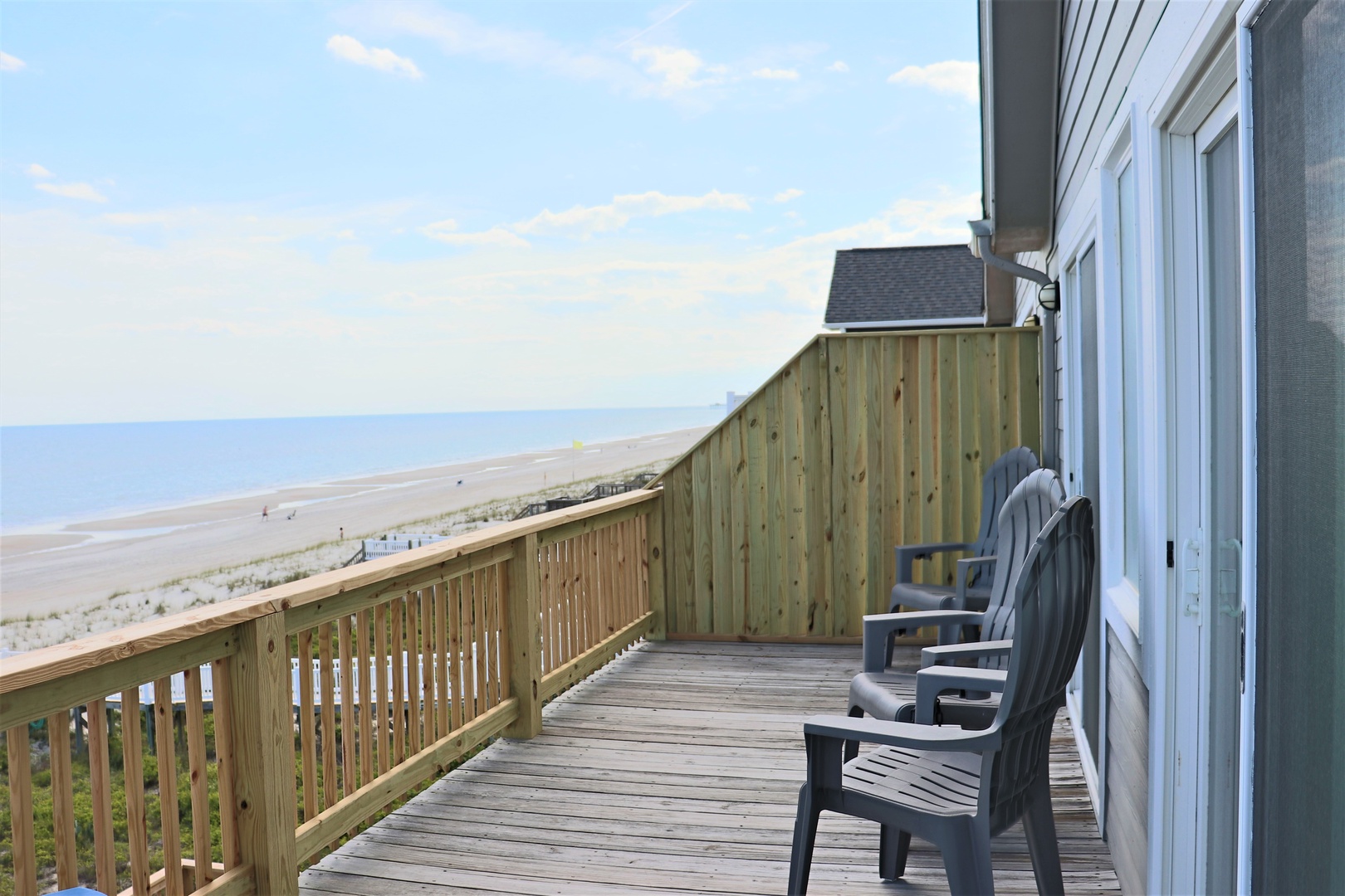 Relax in comfort on your private deck while taking in stunning ocean views and feeling the gentle sea breeze.