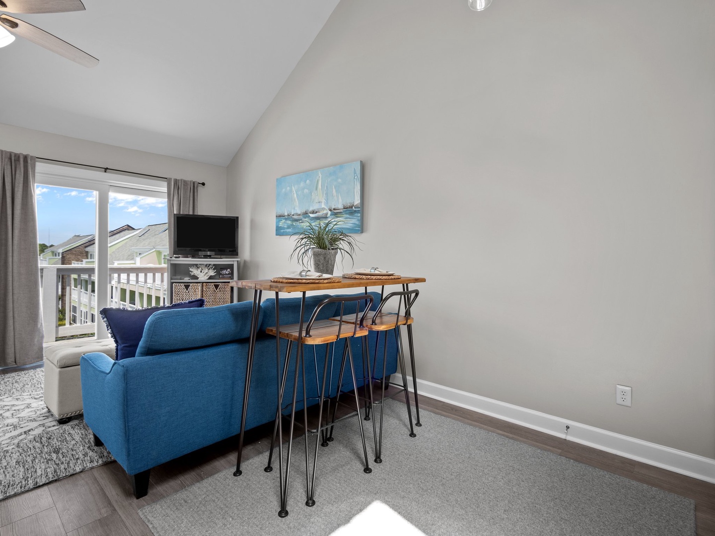 Your bright living space features comfortable seating and a convenient workspace, perfect for relaxing or catching up on tasks.