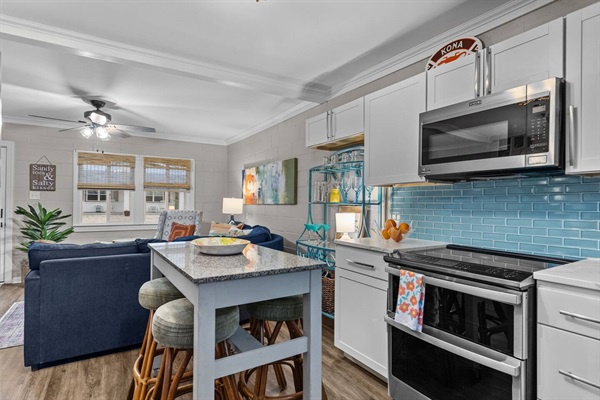 Your bright kitchen flows seamlessly into the living area, perfect for cooking meals while staying connected with everyone.