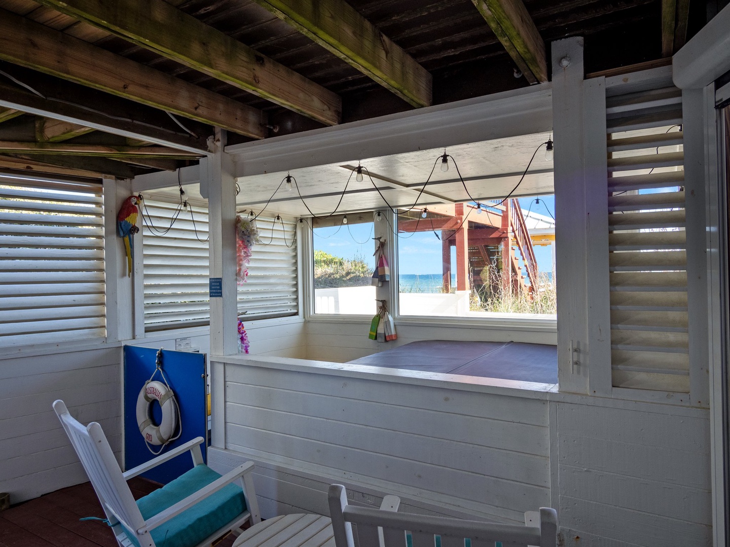 Your beachside retreat features stunning sea views from every angle, with colorful tropical charm just steps from paradise.