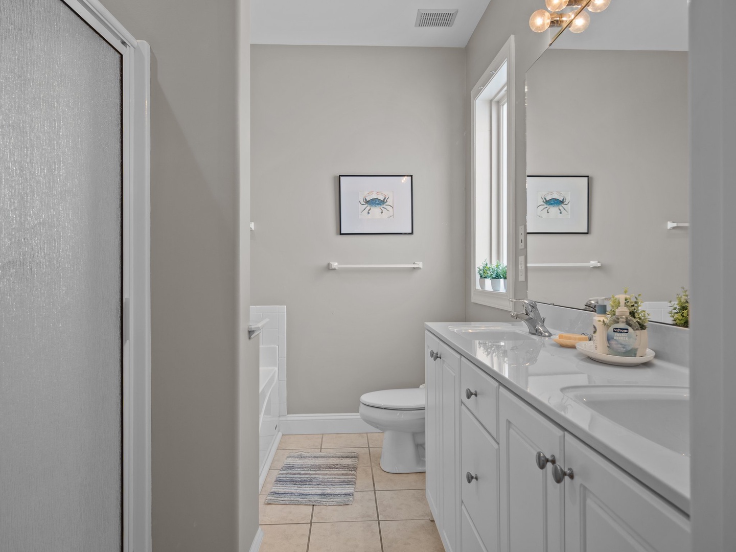 Step into your serene bathroom oasis with coastal charm and modern comfort for your perfect getaway.