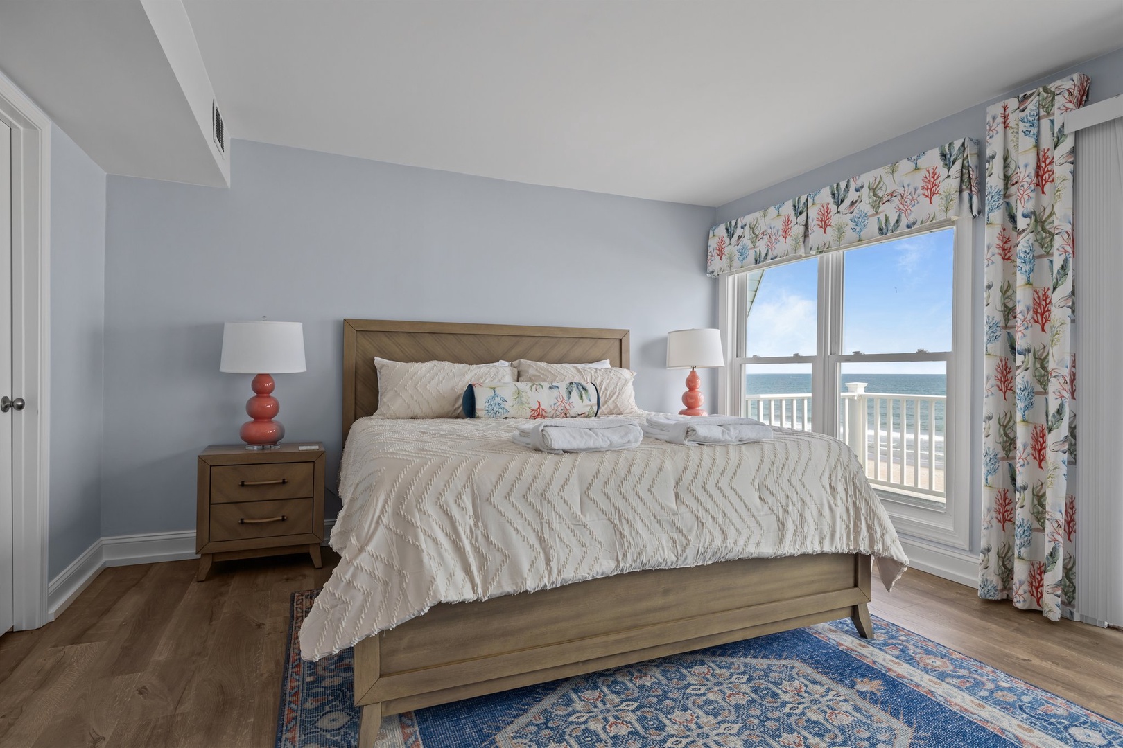 Wake up to stunning ocean views from your comfortable bedroom, where soft linens and coastal decor create the perfect seaside retreat.