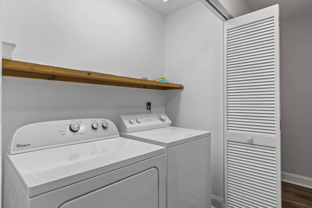 Your private laundry room keeps vacation outfits fresh with full-size washer and dryer, plus handy storage shelf for supplies.