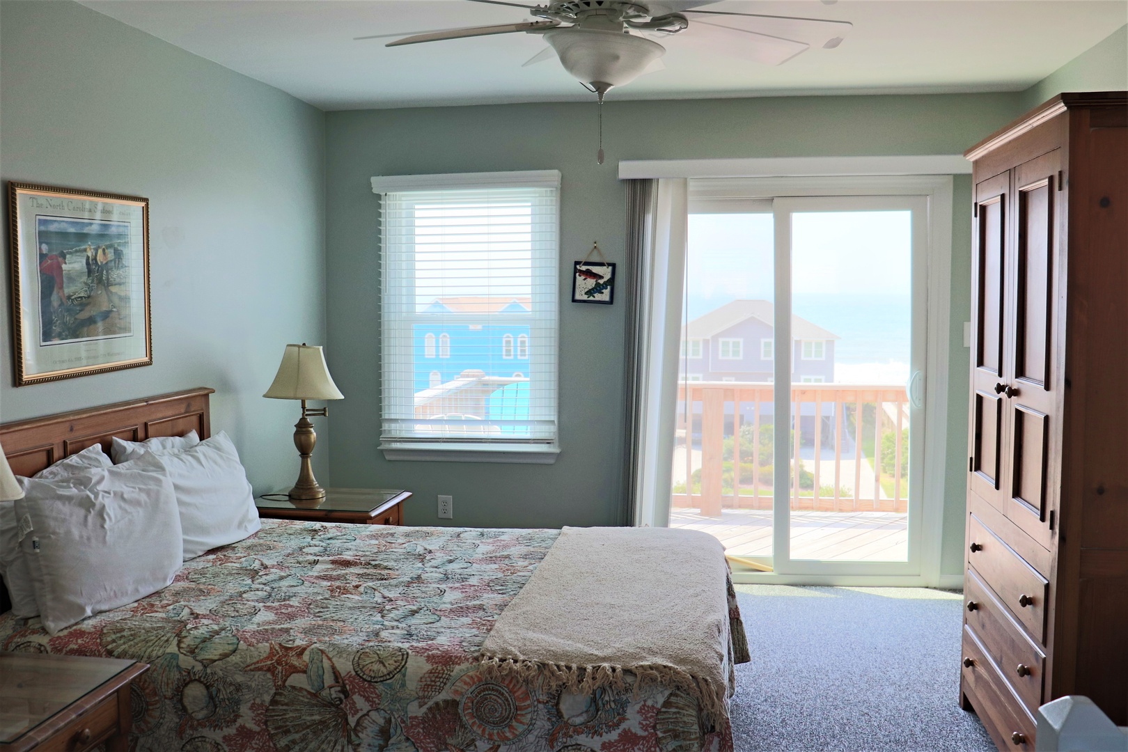 Wake up to peaceful mornings in your comfortable bedroom, where soft coastal hues and ocean breezes create the perfect retreat.