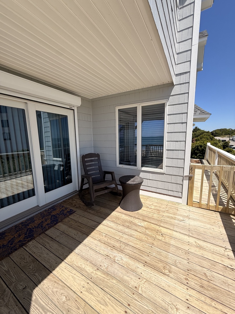 Your private outdoor retreat features a compact balcony with seating—perfect for morning coffee or unwinding with a book in the fresh air.