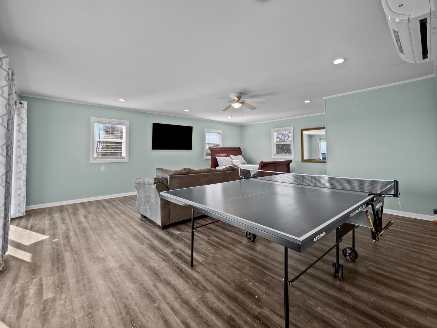 Unwind in your entertainment haven with ping pong battles and movie nights on the big screen TV.