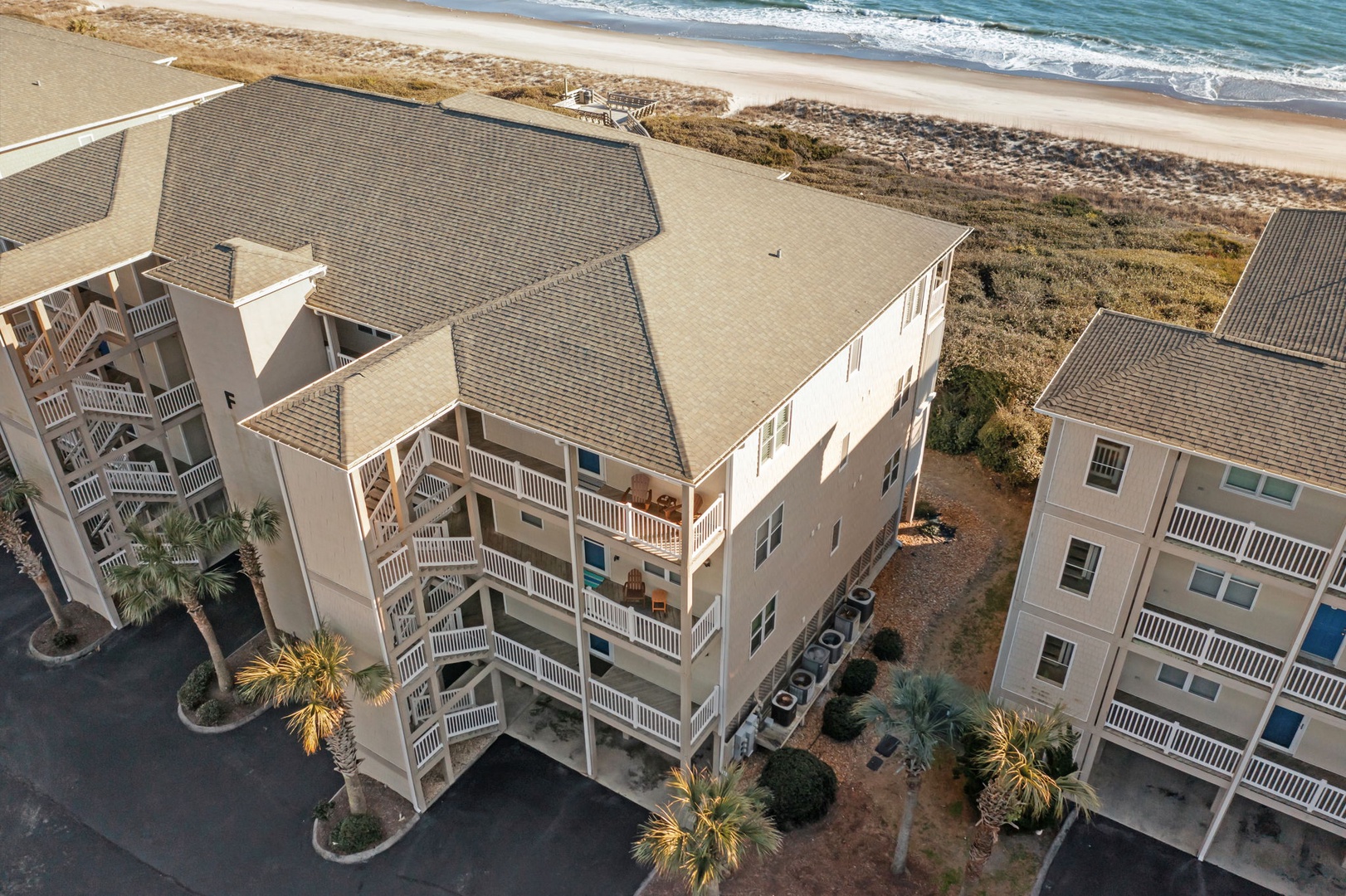 Stunning beachfront property offering direct beach access with pristine sandy shores and rolling ocean waves just steps away.