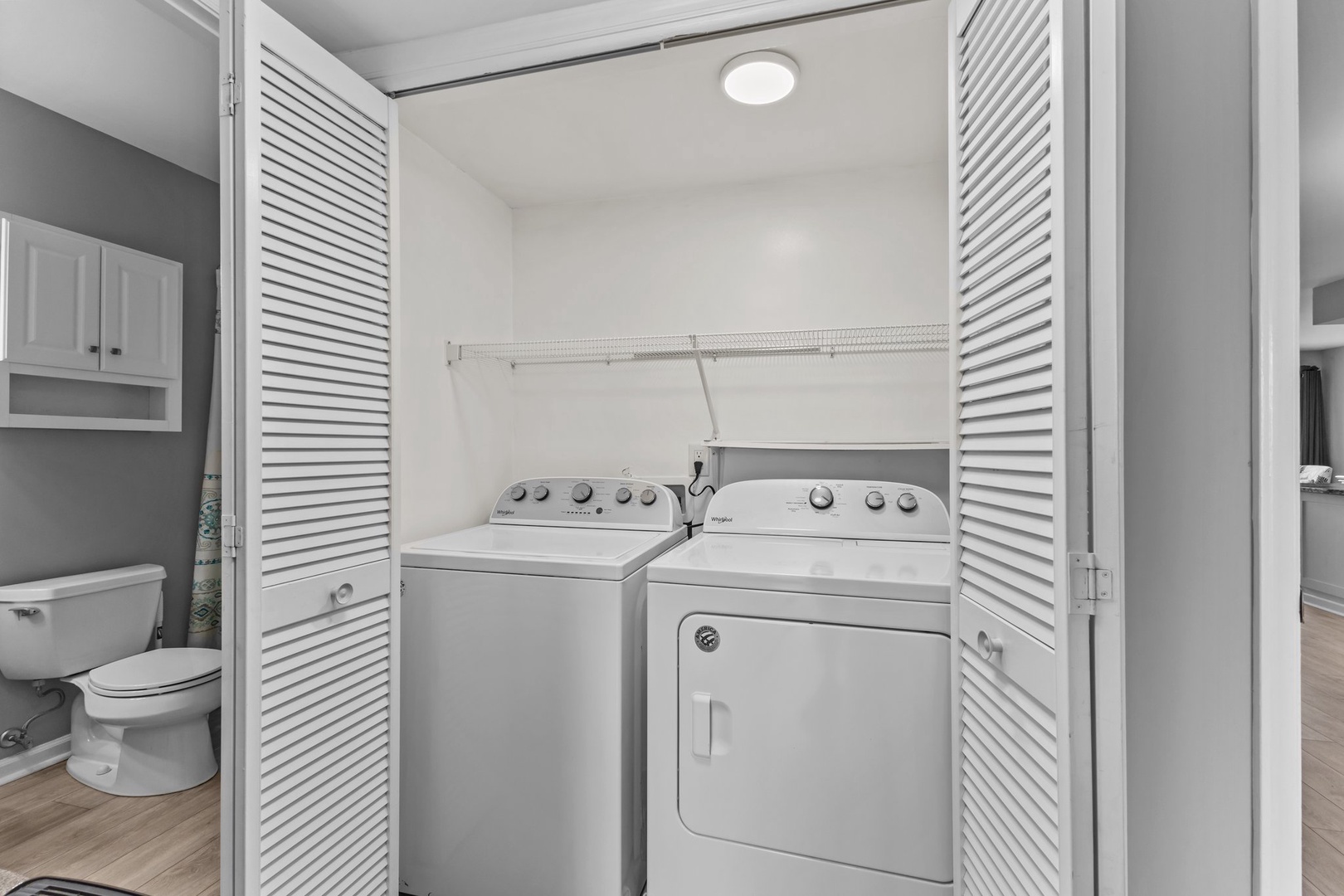 Your in-unit washer and dryer make laundry effortless, tucked away in this convenient closet space.