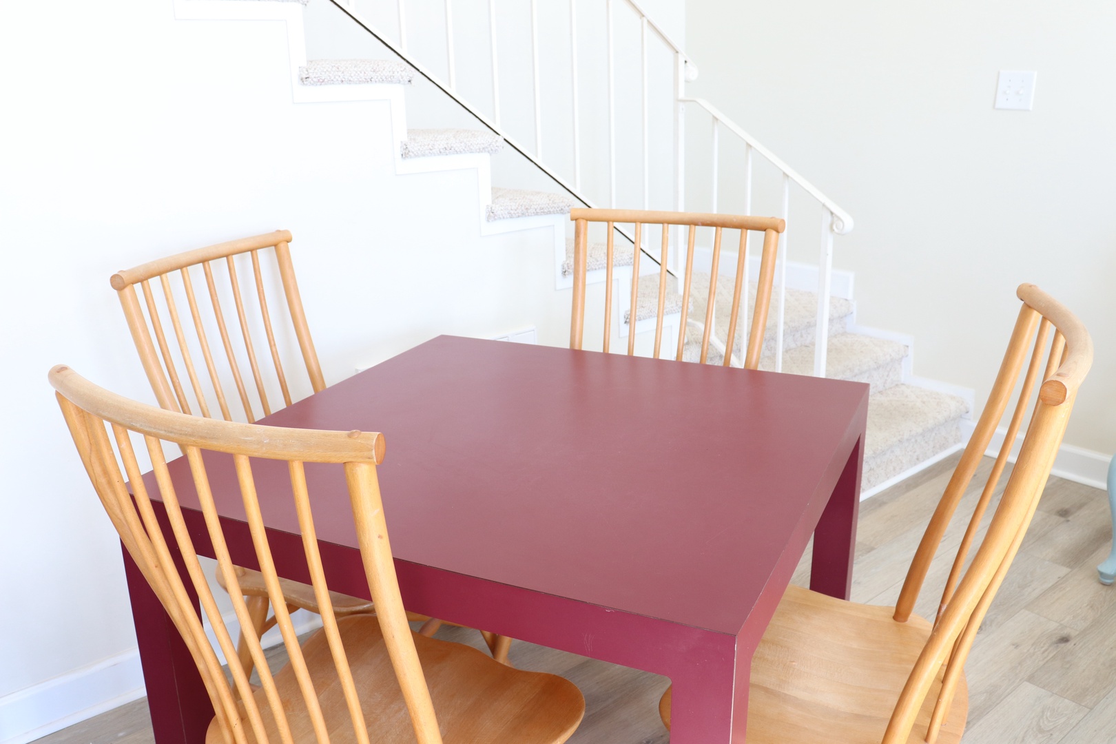 Gather around your bright dining table for meals and conversation, with stairs leading to your upstairs retreat.