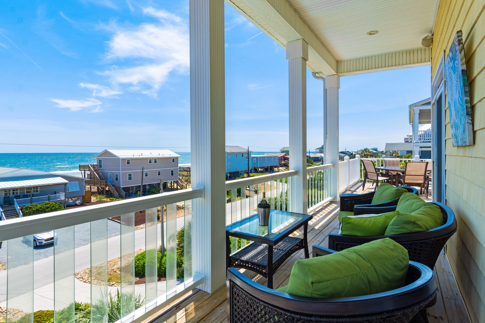 Relax on your private balcony with stunning ocean views, comfortable seating, and the perfect spot to watch the waves.