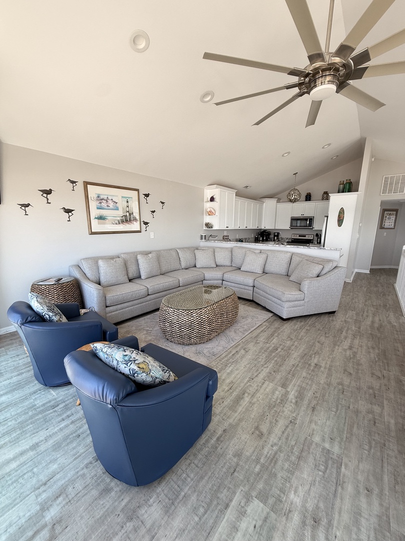 Settle into your bright, open living space with plush seating, modern finishes, and coastal-inspired touches. A stylish haven to unwind after exploring all day.