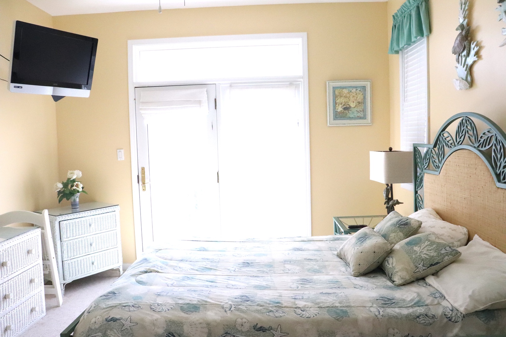 Unwind in your coastal-themed bedroom where soft linens and ocean-inspired décor create the perfect retreat after beach days.