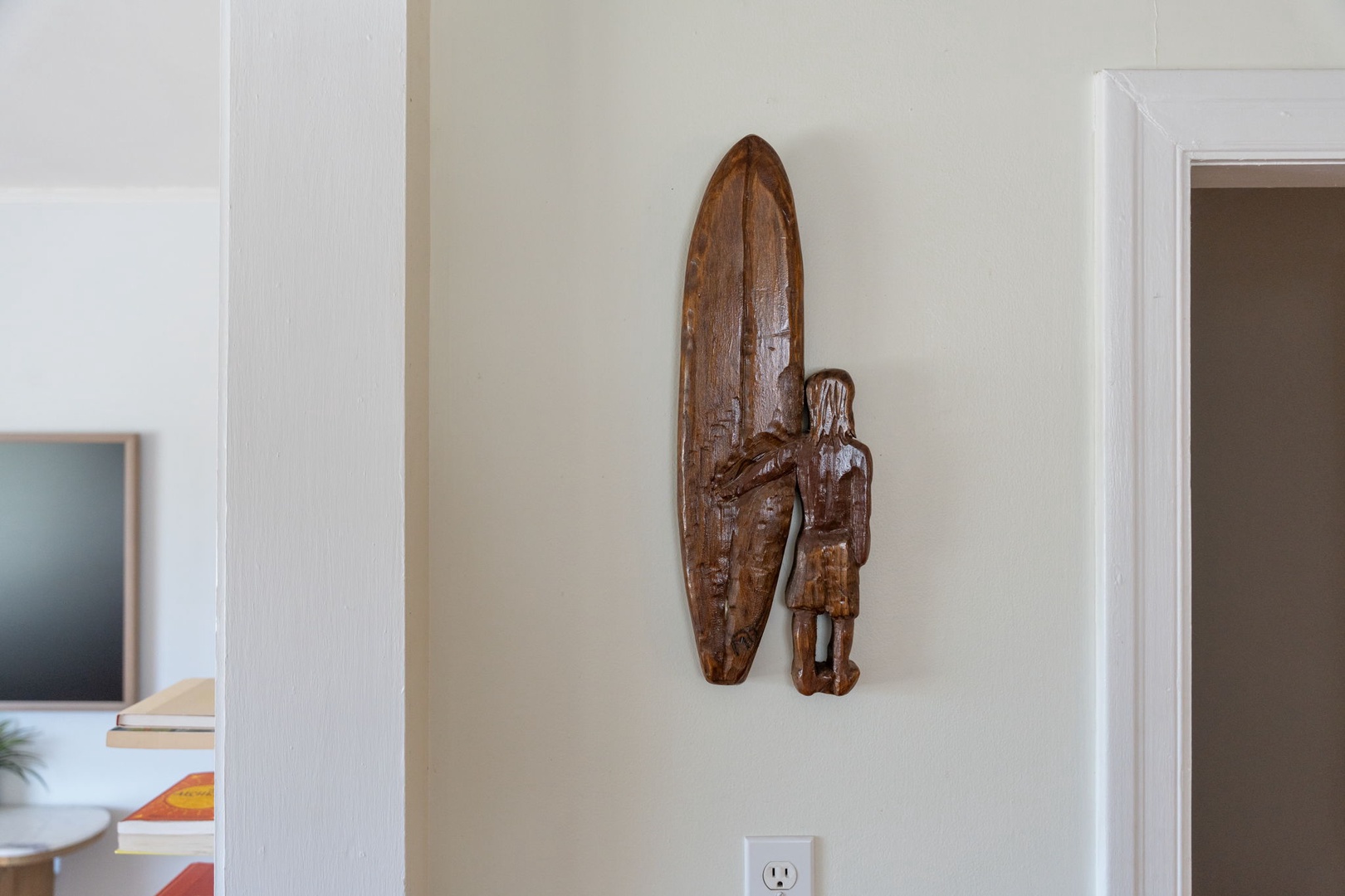Admire unique coastal artwork while you move through your peaceful retreat, where charming details create a welcoming atmosphere.