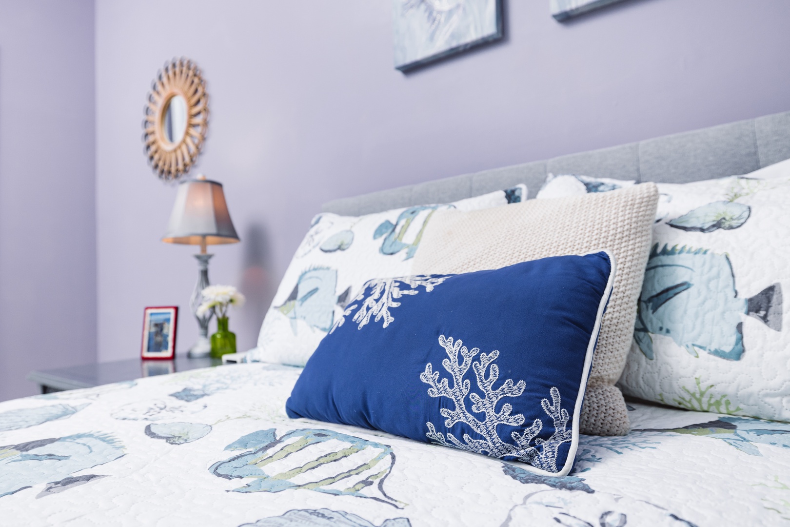 Sink into soft linens adorned with coastal patterns, where nautical blues and coral details create your seaside sanctuary.