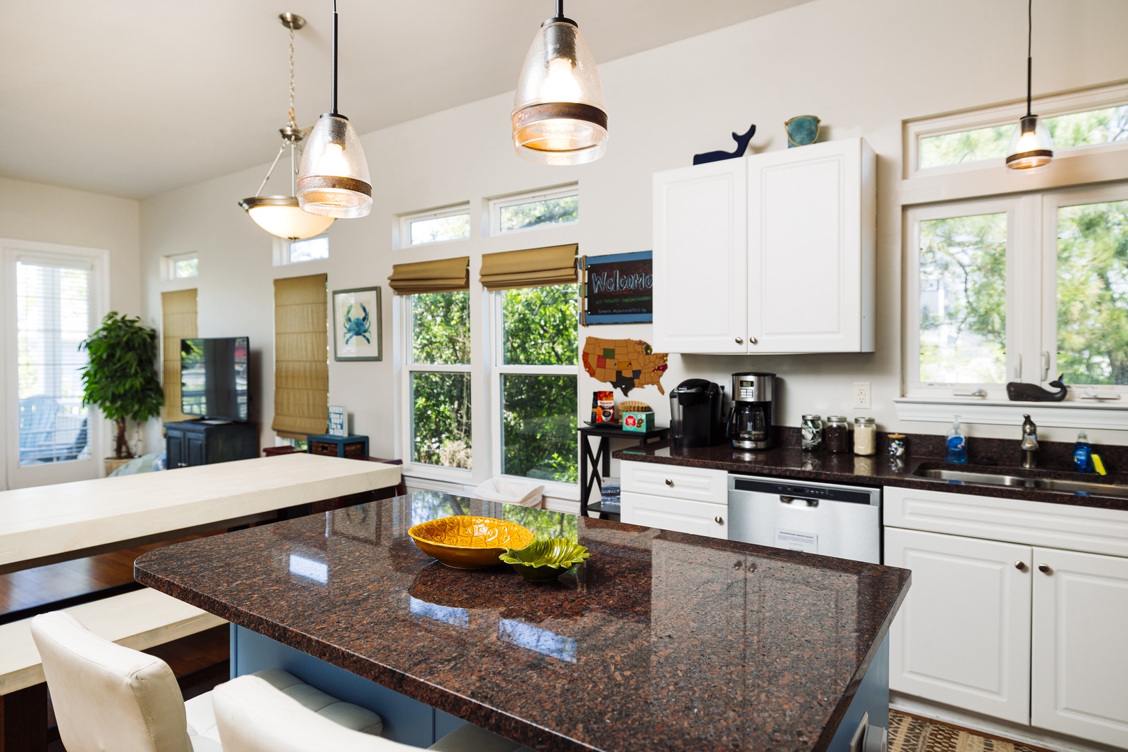Your spacious kitchen features granite countertops, modern appliances, and abundant natural light for memorable meal preparation.