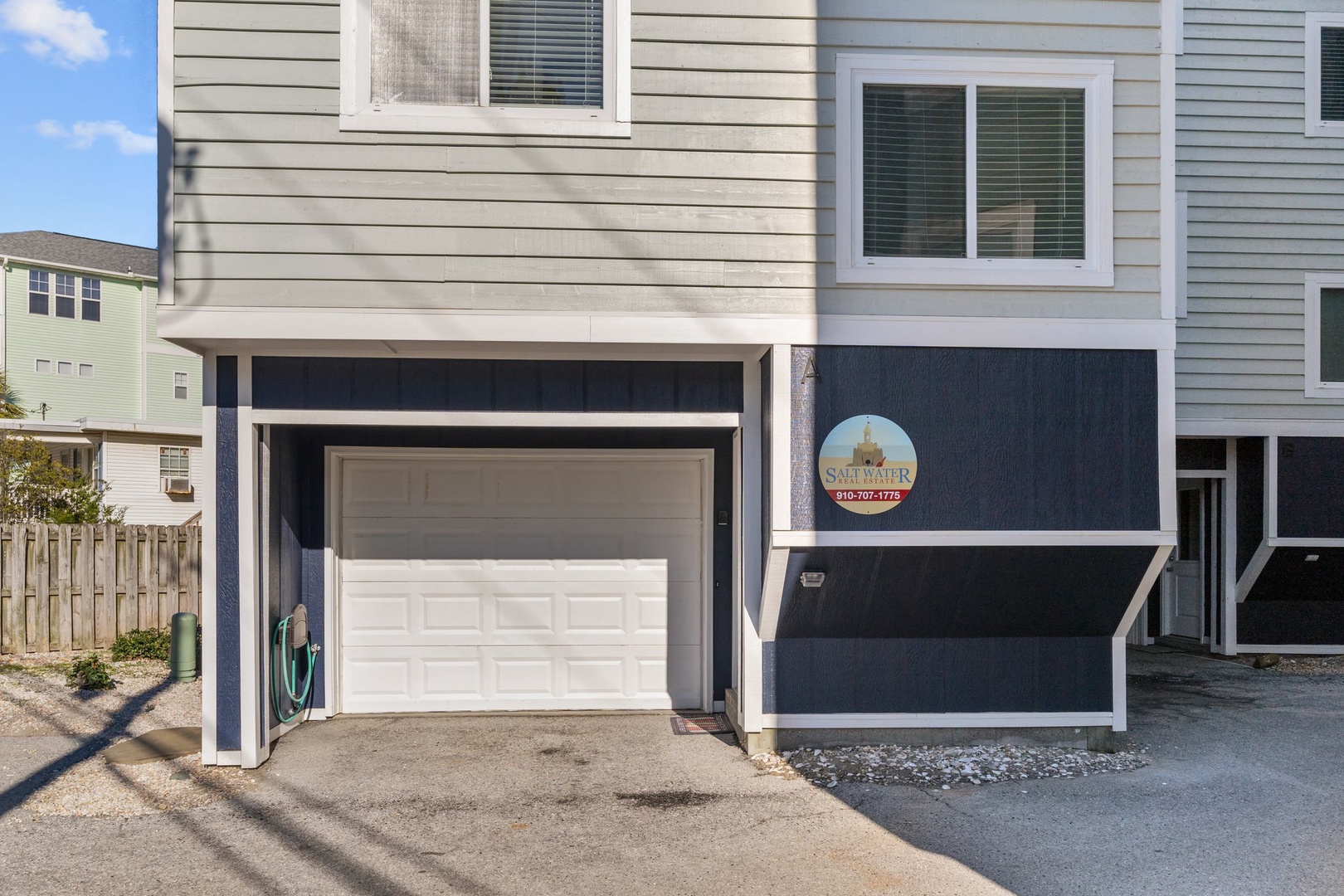 Modern beachside property with convenient garage parking and easy access to your coastal getaway.