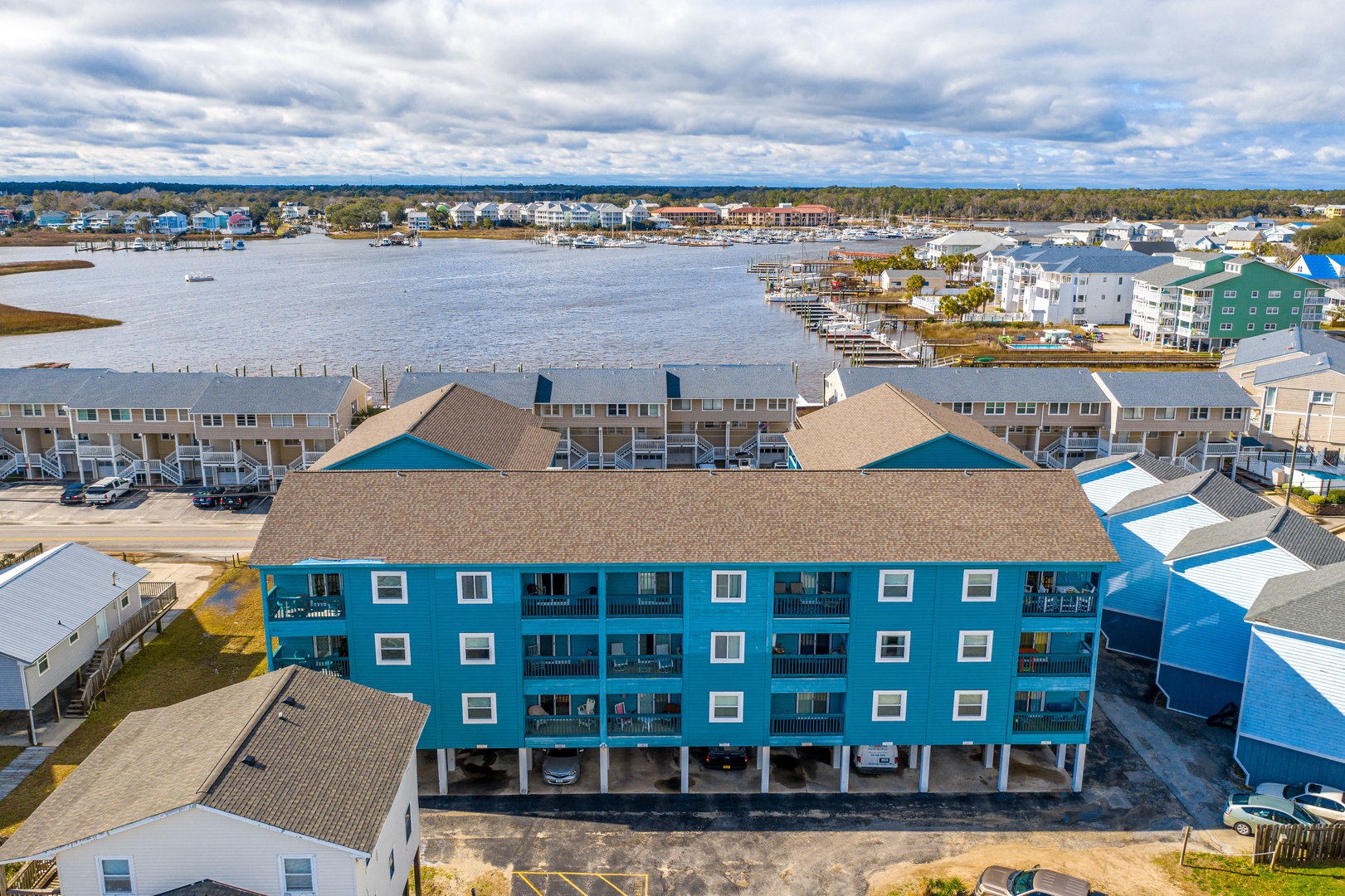 Waterfront vacation property featuring marina views and coastal charm in a picturesque harbor setting.