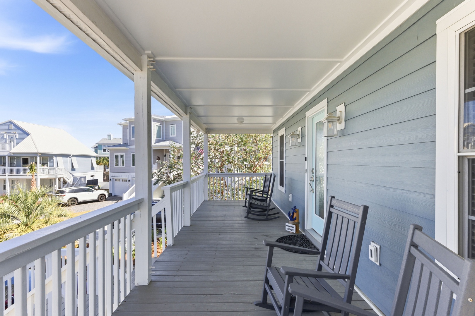 Your spacious covered porch offers a peaceful retreat with cozy rocking chairs, perfect for morning coffee or watching the neighborhood come alive.