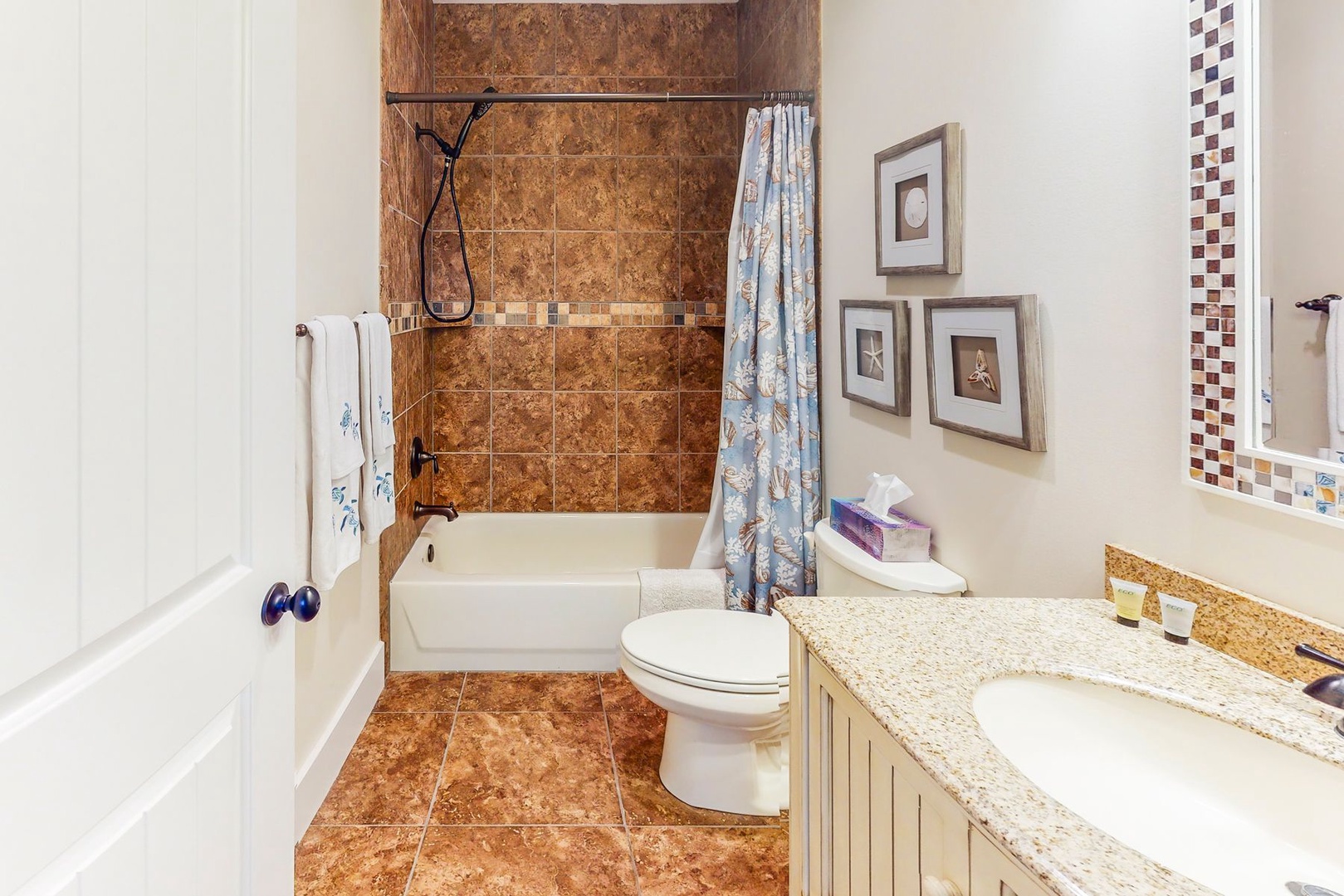 Your private bathroom features elegant granite counters, a relaxing tub-shower combo, and thoughtful amenities for your comfort.