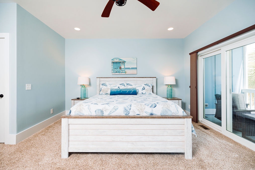 Drift off to peaceful dreams in your coastal-themed bedroom, complete with ocean-inspired decor and a private balcony for morning coffee.