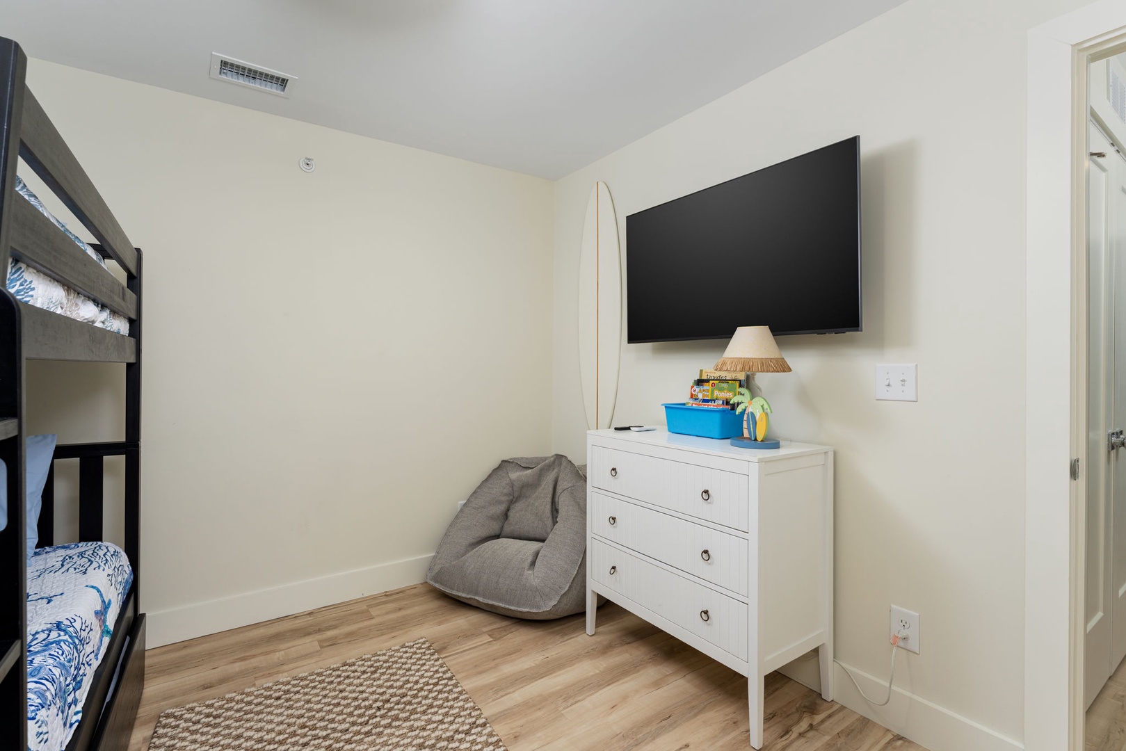 Your kids will love this cozy bunk room with entertainment and storage for all their vacation treasures.