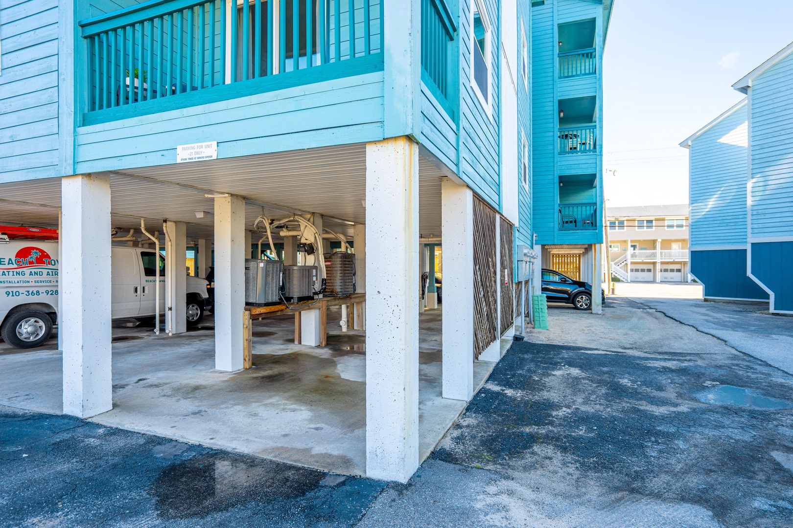 Covered parking provides secure shelter for your vehicle, with easy access to beach rental building.