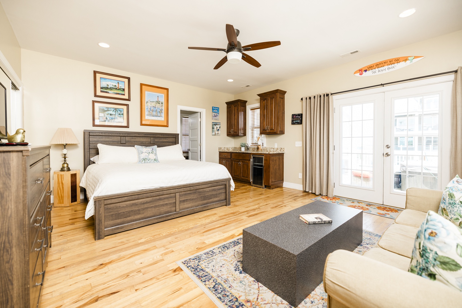 Unwind in your spacious studio with a cozy bed, kitchenette, and private balcony where natural light fills the room.