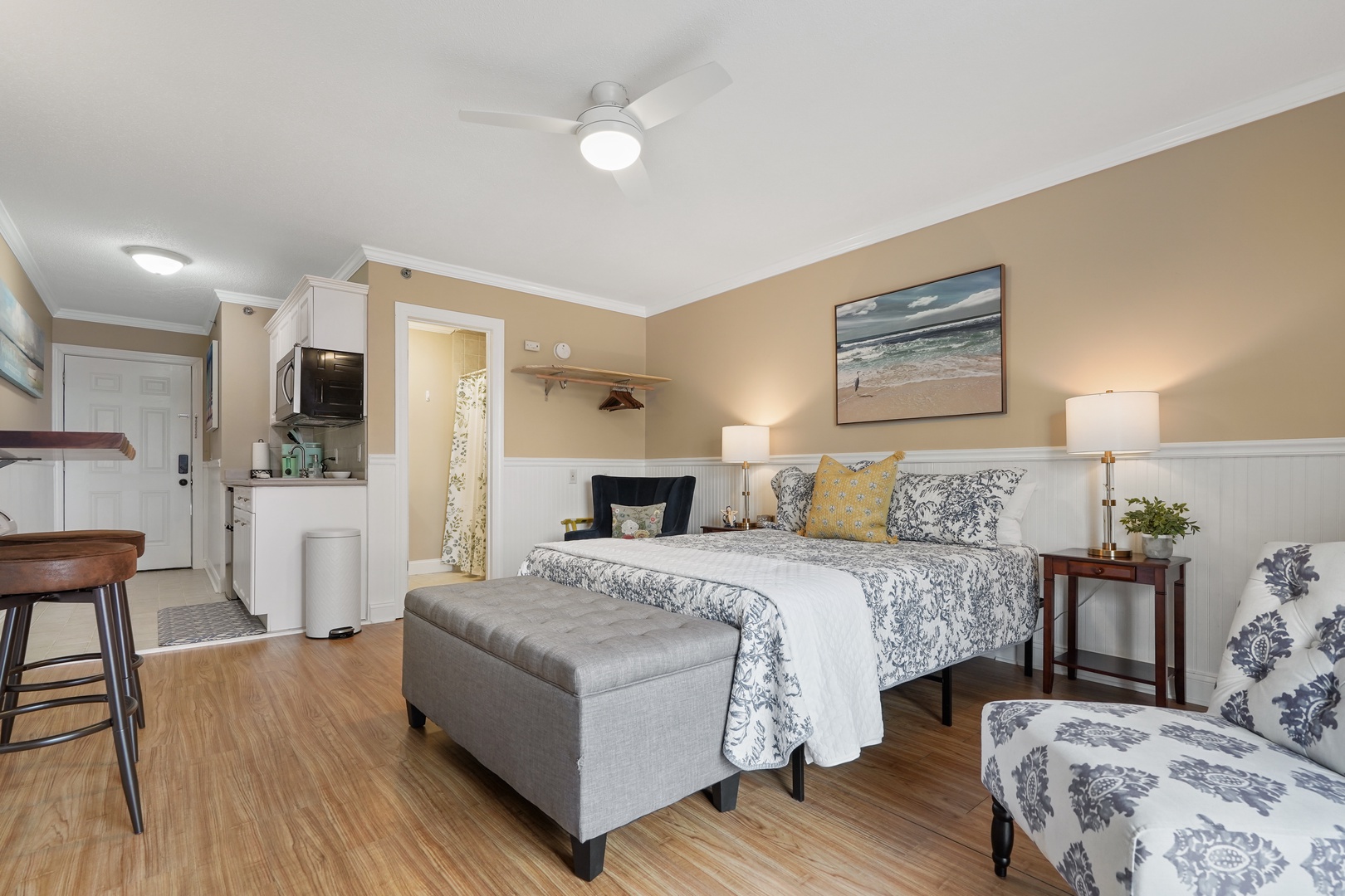 Unwind in your elegantly styled studio with coastal-inspired decor, comfortable seating, and thoughtful amenities for a relaxing coastal getaway.