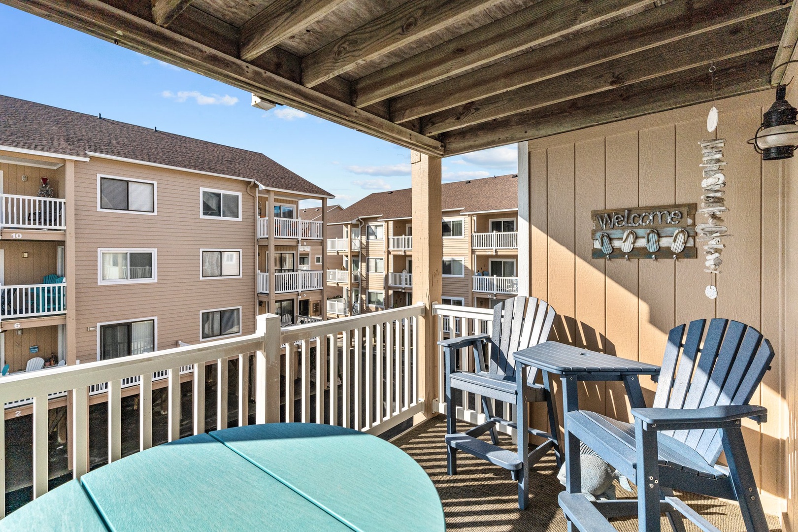 Your private balcony features Adirondack chairs and table where you can unwind with morning coffee or evening conversations.