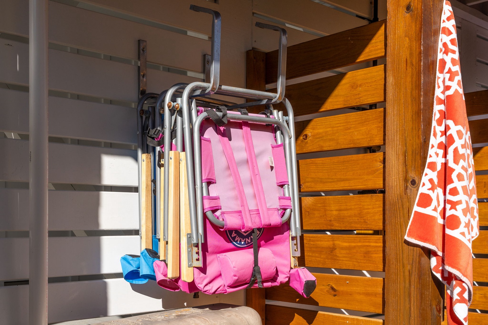 Convenient storage awaits your beach essentials with these handy hooks - perfect for drying towels and organizing your gear.