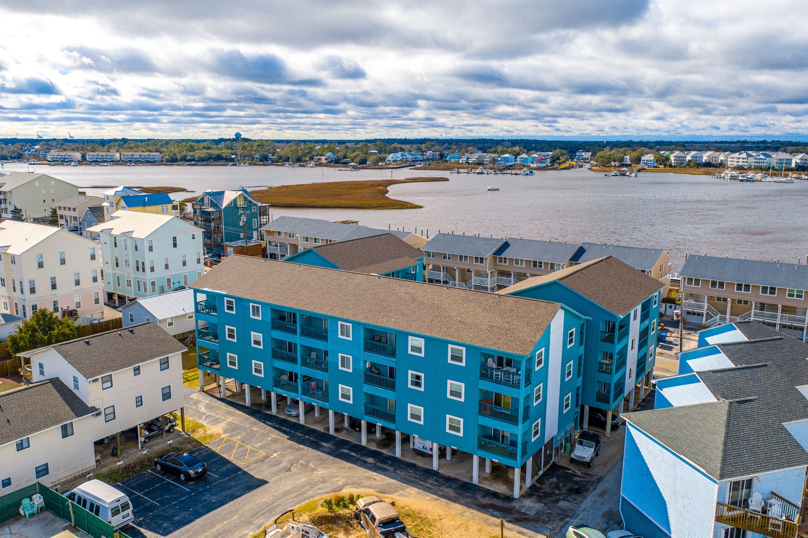 Waterfront vacation rental community with direct bay access and panoramic coastal views.