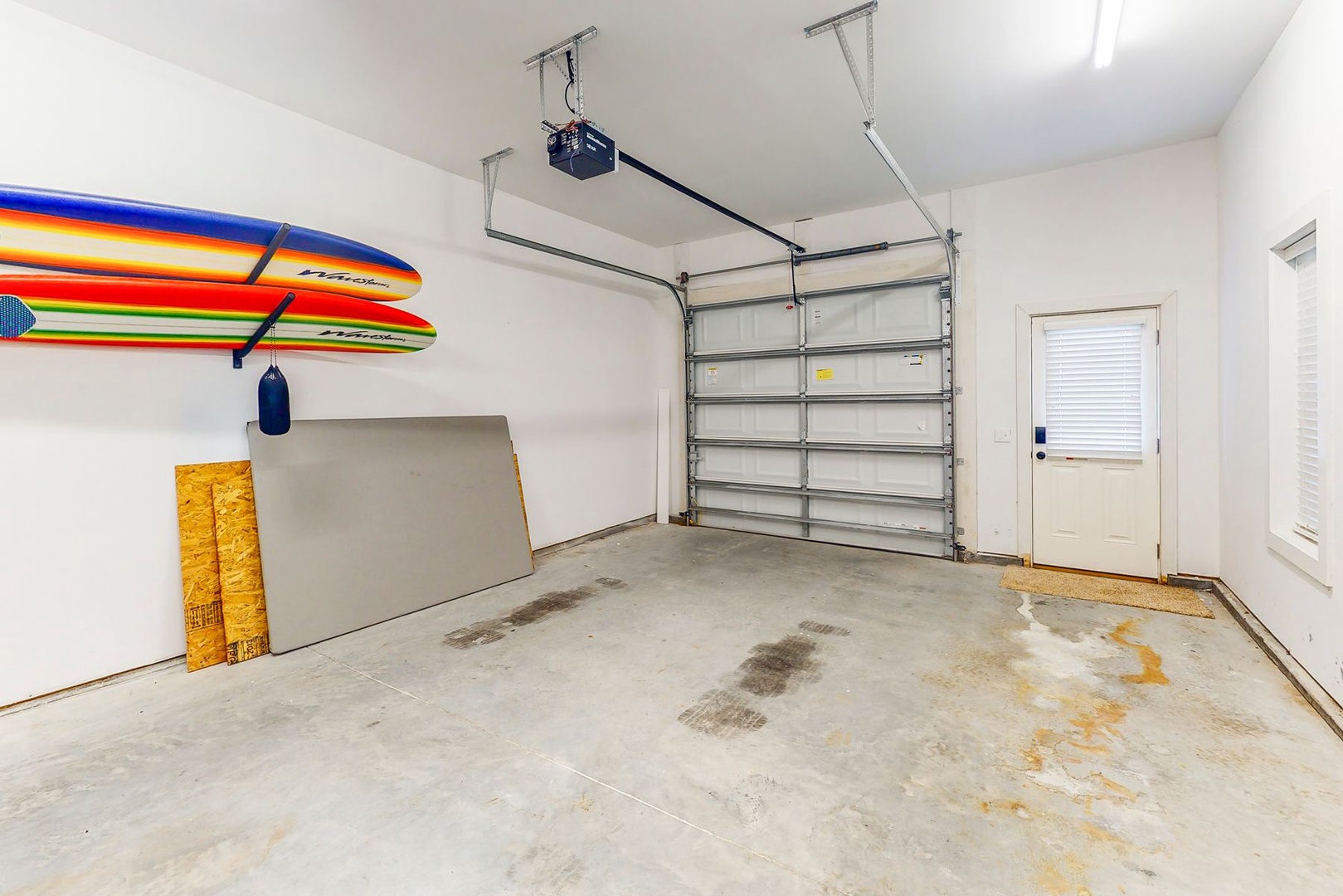 Your private garage offers secure parking and storage space, complete with kayak racks for your beach adventures.