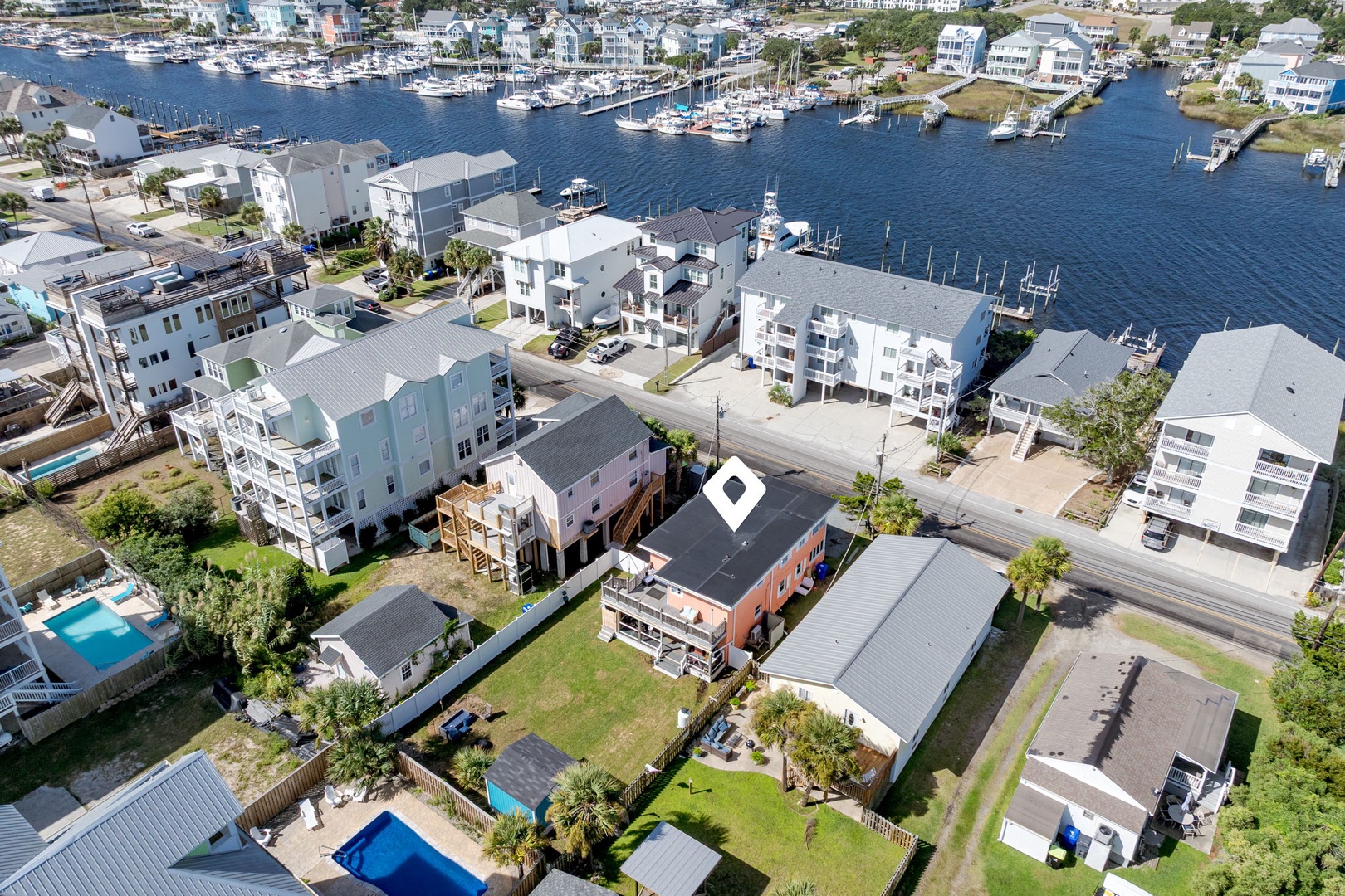 Waterfront community with marina access, featuring boat slips and coastal homes just minutes from pristine waters.