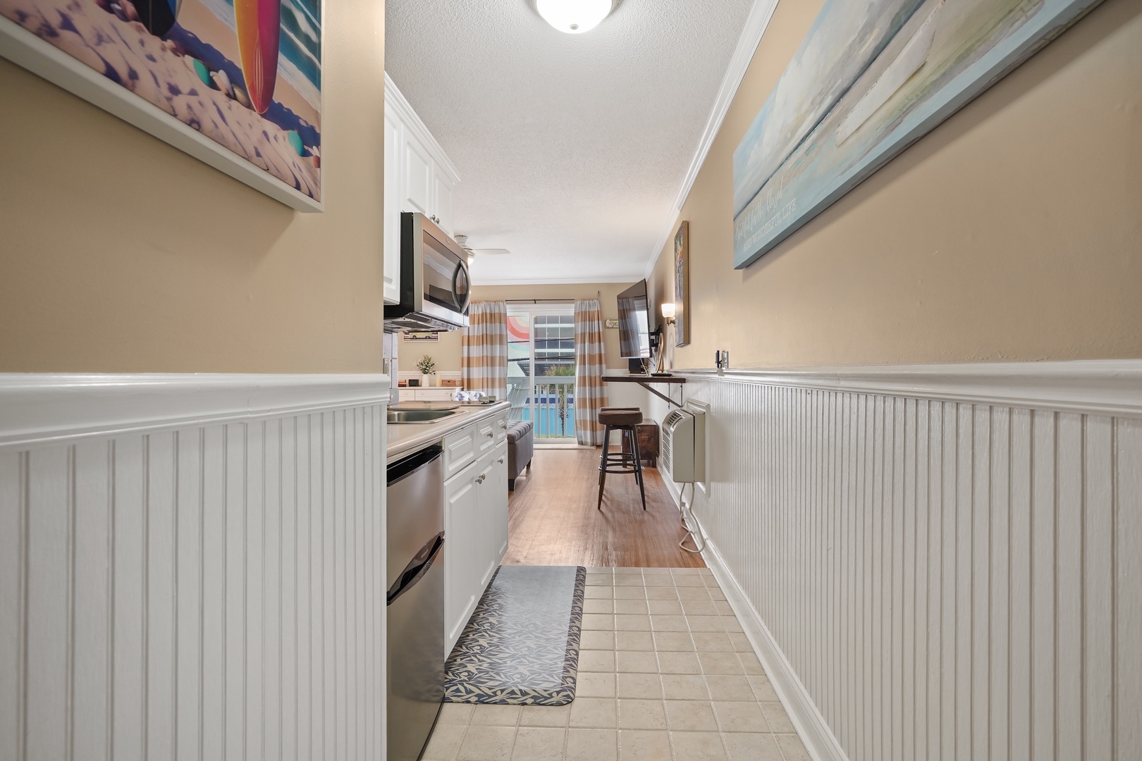 Your fully equipped galley kitchen features modern appliances and ample counter space for preparing meals during your stay.