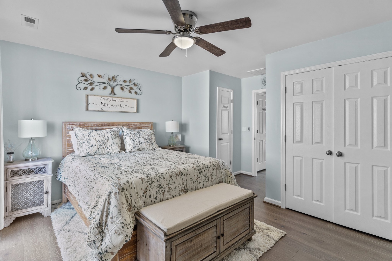 Drift into peaceful dreams in your serene master bedroom, where soft blues and cozy textures create the perfect retreat.