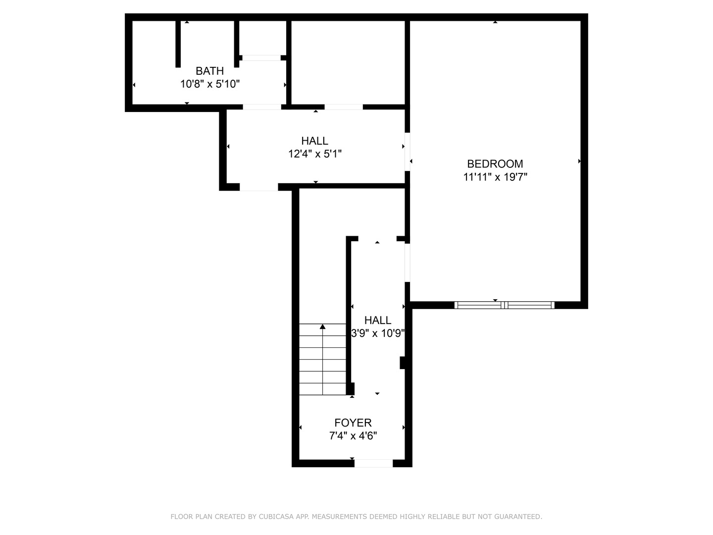 Clear floor plan showing the layout of your rental: spacious bedroom, convenient bathroom, welcoming foyer, and connecting hallways for easy navigation.