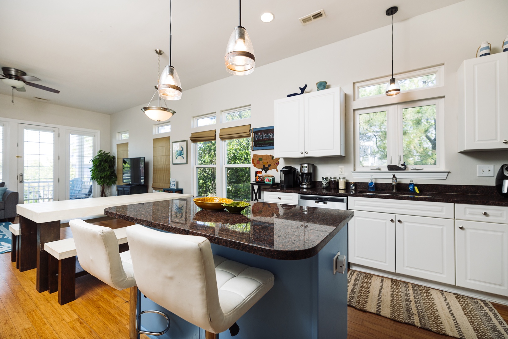 Cook memorable meals in your spacious kitchen featuring granite counters, modern appliances, and bar seating for casual dining.