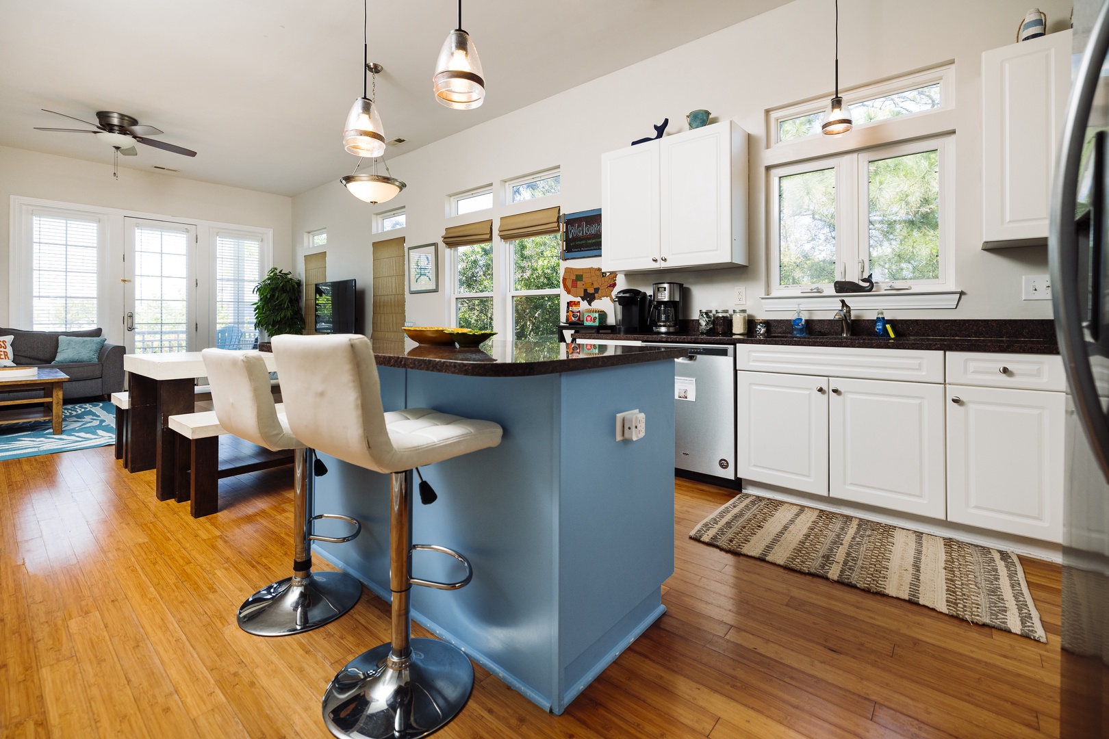 Your spacious kitchen flows into the cozy living area, creating the perfect gathering spot for morning coffee and evening conversations.