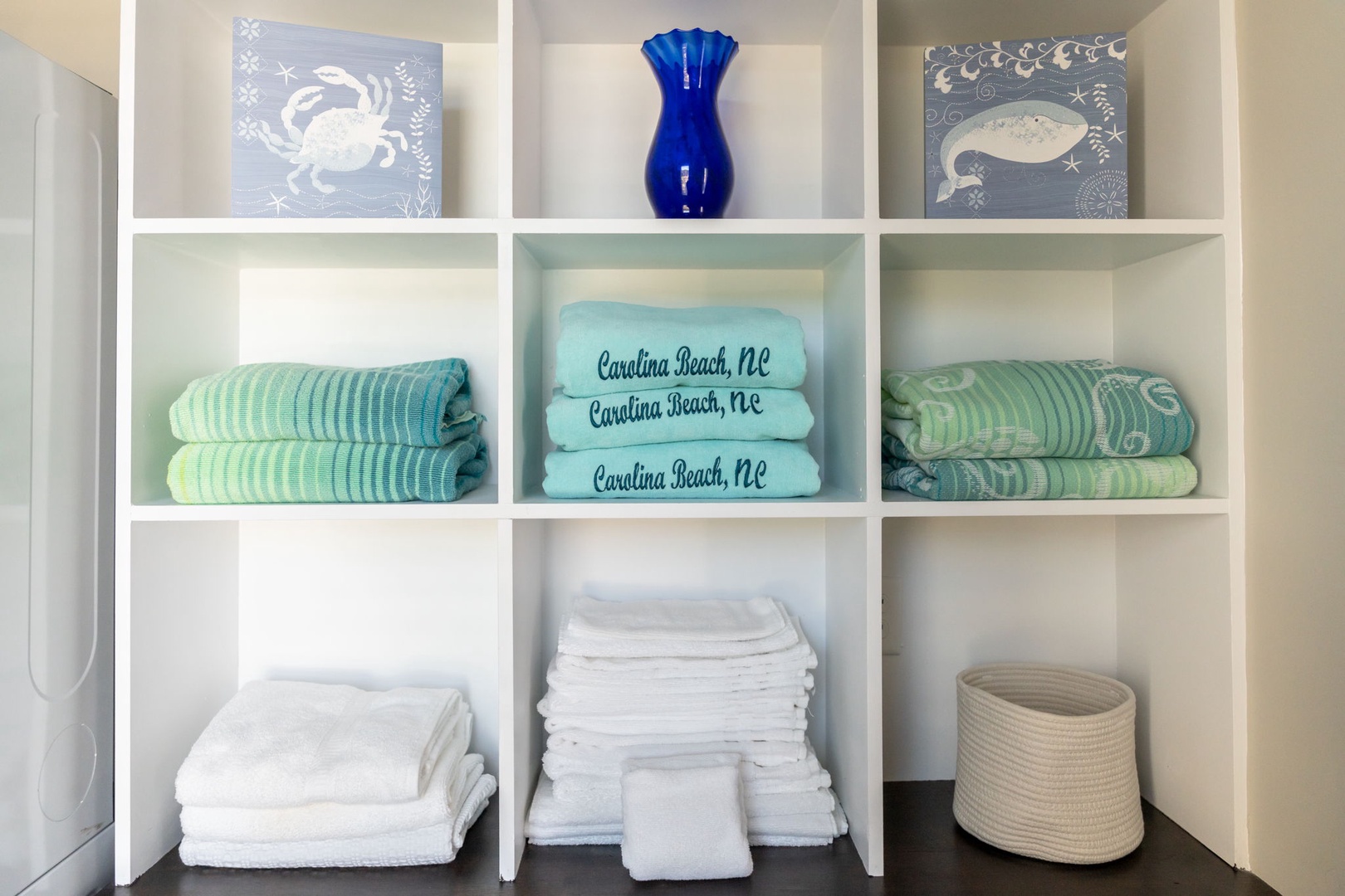 Your towels are thoughtfully organized with local Carolina Beach touches and coastal decor to make you feel at home.