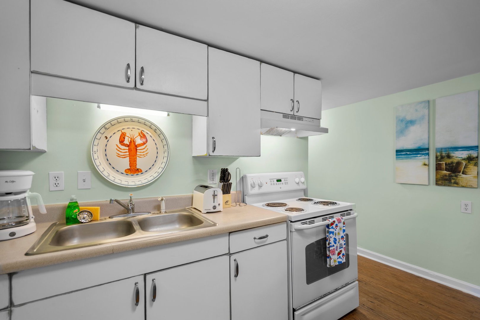 Your fully-equipped kitchen awaits with everything needed to prepare delicious meals, from morning coffee to seafood feasts.