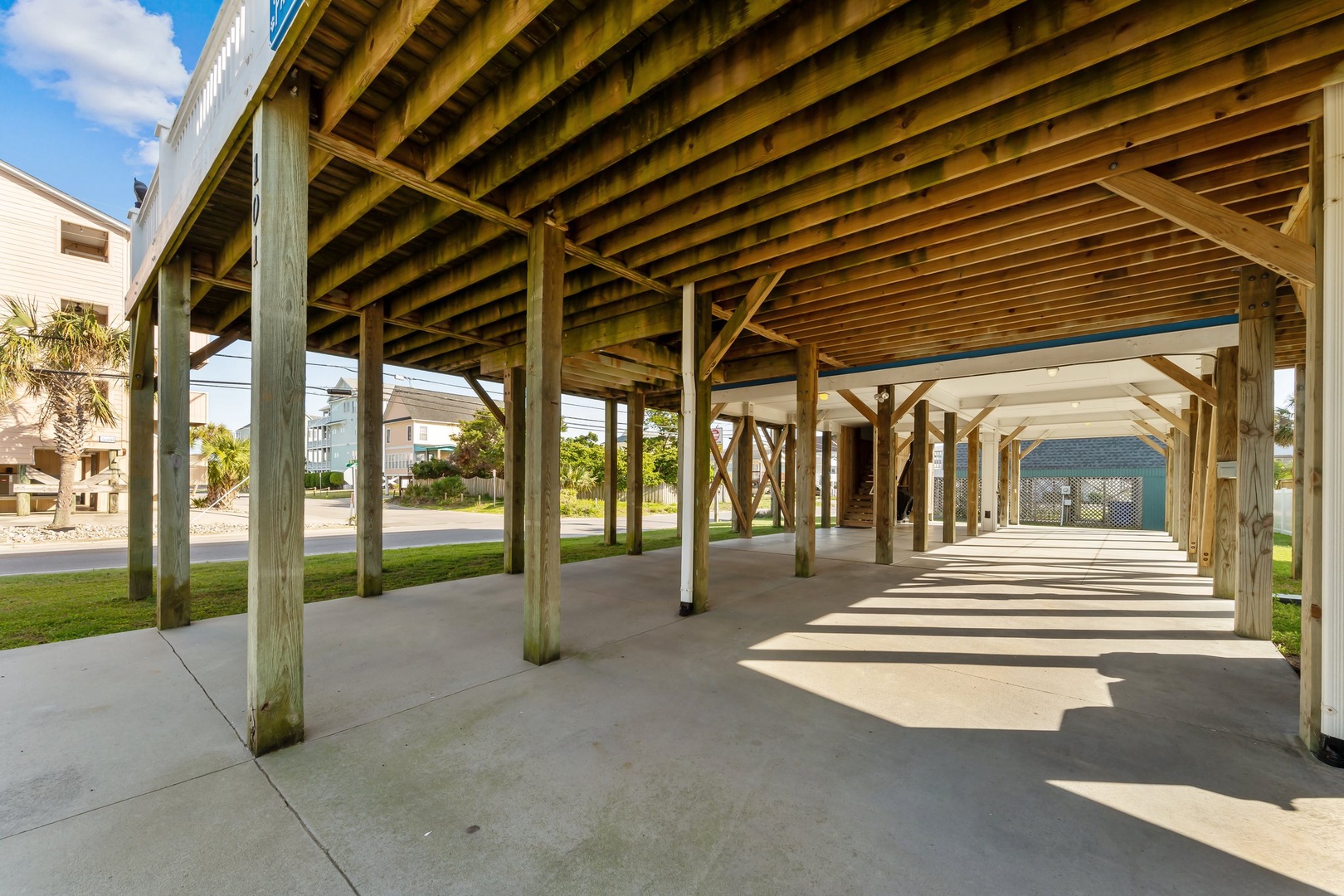 Spacious covered parking provides protection for your vehicle while you enjoy your coastal getaway.