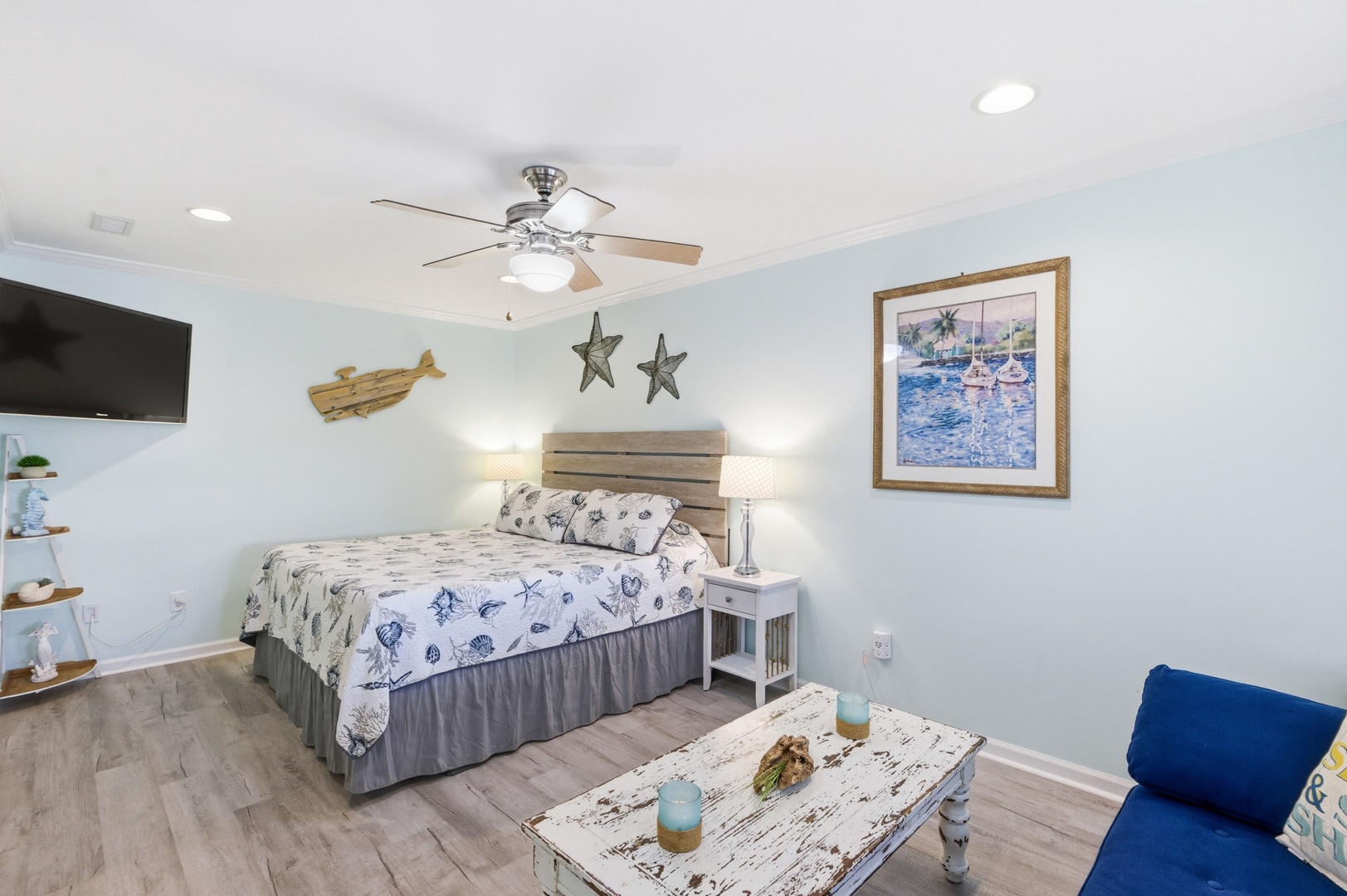 Relax in your coastal-inspired bedroom with beachy decor, a comfy bed, and nautical touches that bring the seaside indoors. Your peaceful retreat awaits.