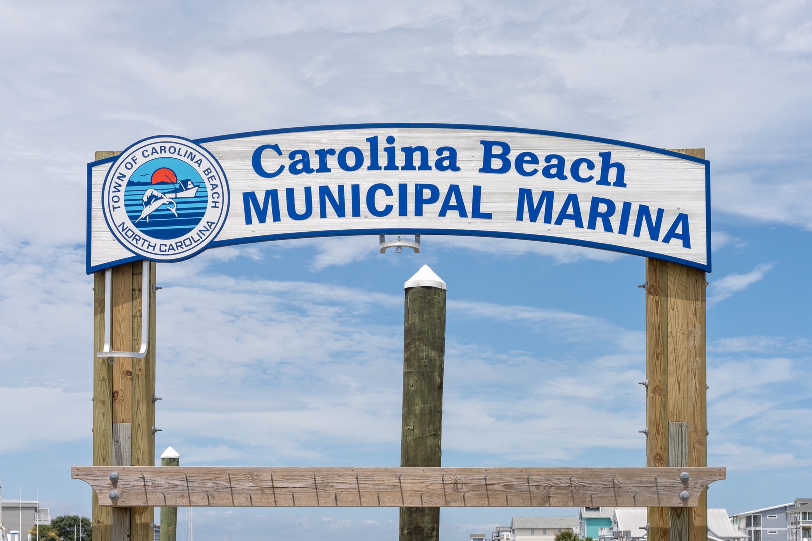 The Carolina Beach Municipal Marina entrance sign marks the gateway to this waterfront destination in North Carolina.