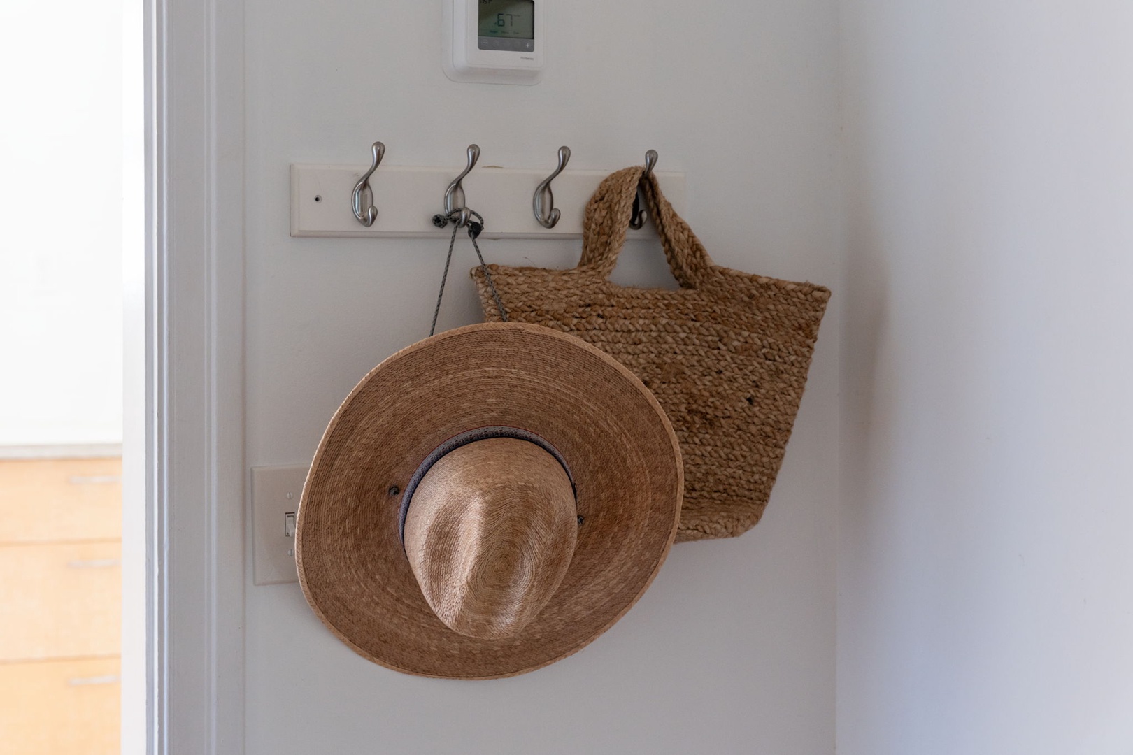 Hang your sun hat and beach bag on these convenient hooks, ready for your next coastal adventure.