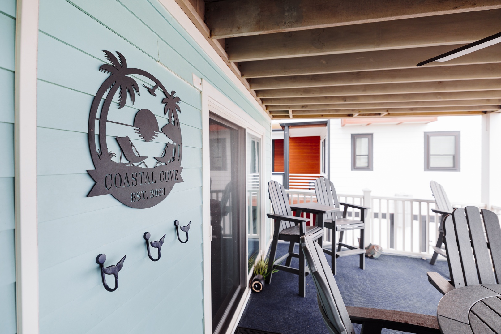 Relax on your private covered deck with coastal views and comfortable seating, perfect for morning coffee or evening unwind.