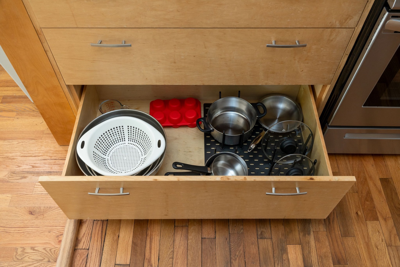 Your kitchen drawer is perfectly organized with quality cookware and utensils, making meal prep effortless during your stay.
